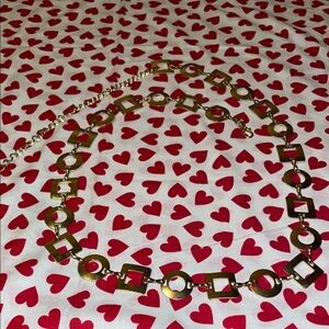 Gold tone Geometric belt (51”)